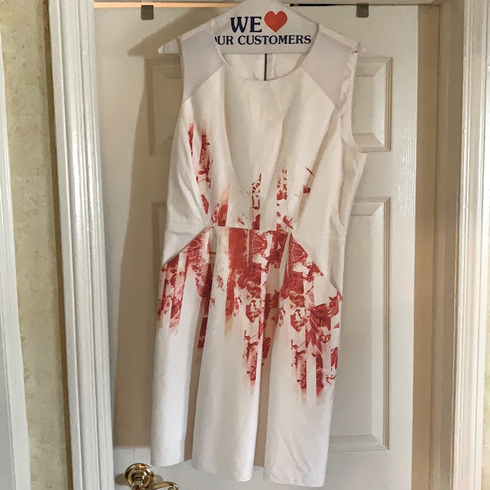 White with pink design dress